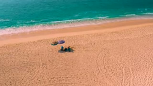 DESERT PARK NATURAL RESERVE BAJA CALIFORNIA SUR MEXICO-2020: Aerial View of People Relaxing on Sandy Beach
