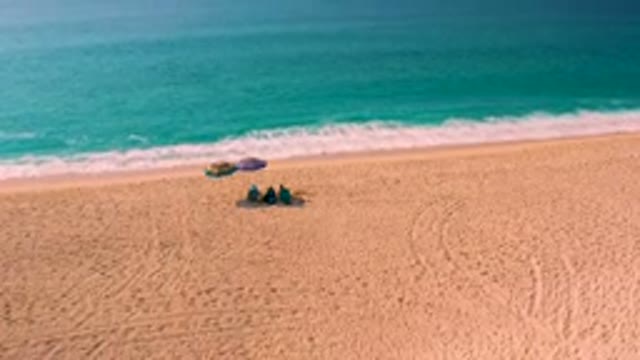 DESERT PARK NATURAL RESERVE BAJA CALIFORNIA SUR MEXICO-2020: Aerial View of People Relaxing on Sandy Beach