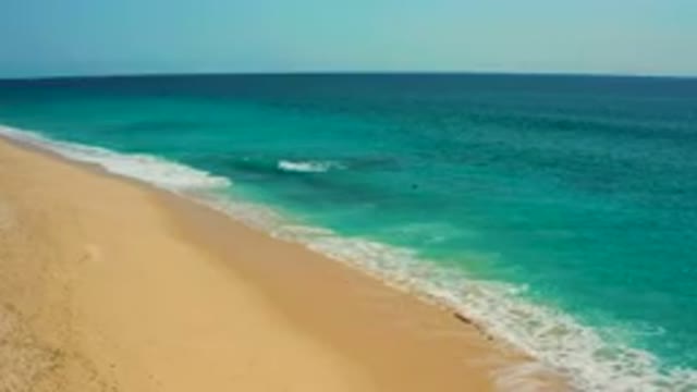 DESERT PARK NATURAL RESERVE BAJA CALIFORNIA SUR MEXICO-2020: Aerial View Of Turquoise Ocean Waves Washing Over Sandy Beach