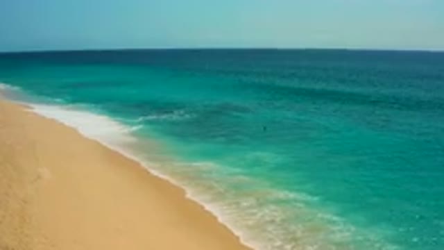 DESERT PARK NATURAL RESERVE BAJA CALIFORNIA SUR MEXICO-2020: Aerial View Of Turquoise Ocean Waves Washing Over Sandy Beach