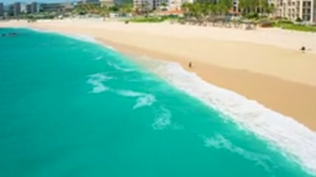 DESERT PARK NATURAL RESERVE BAJA CALIFORNIA SUR MEXICO-2020: Aerial View Of Lone Figure Walking On Beach