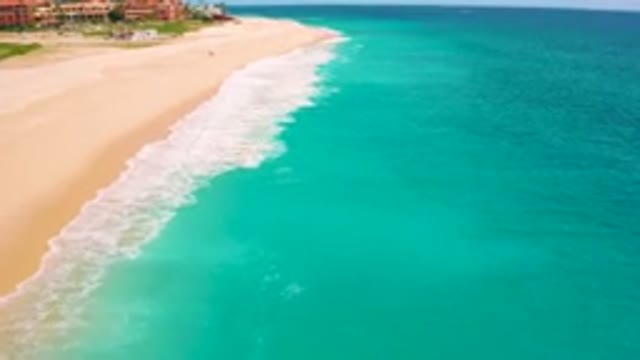 DESERT PARK NATURAL RESERVE BAJA CALIFORNIA SUR MEXICO-2020: Aerial View Of Turquoise Ocean Waves Crashing On Sandy Beach