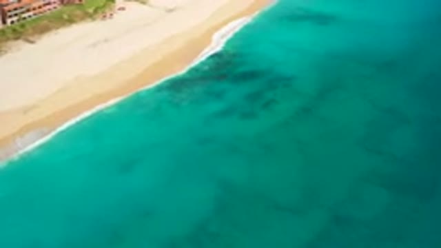 DESERT PARK NATURAL RESERVE BAJA CALIFORNIA SUR MEXICO-2020: Aerial View Of Turquoise Ocean Waves Washing Over Sandy Beach