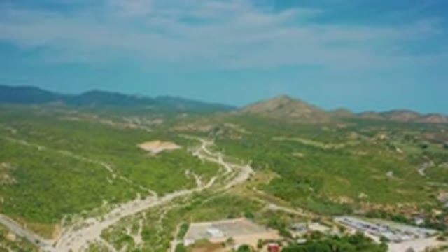 DESERT PARK NATURAL RESERVE BAJA CALIFORNIA SUR MEXICO-2020: Aerial View Of Winding Dirt Roads Through Green Hills