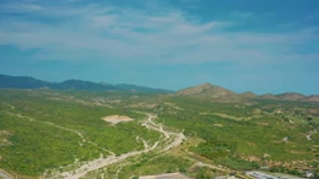 DESERT PARK NATURAL RESERVE BAJA CALIFORNIA SUR MEXICO-2020: Aerial View Of Winding Dirt Roads Through Green Hills